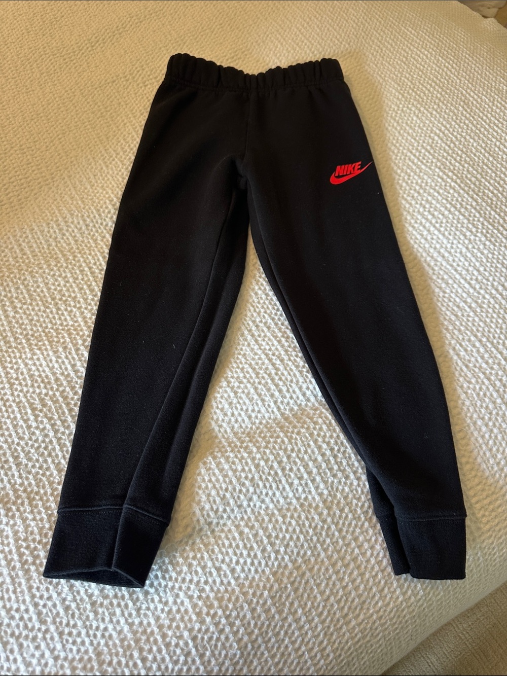 Nike Kids Black Sweatpants with Red Swoosh